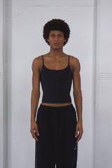 Black tank top and black baggy dance pants